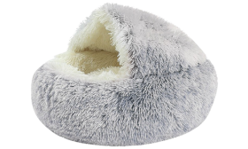 Slipper Pet Bed Slipper-shaped pet bed in grey with a fluffy interior, soft material, cosy, enclosed space for pets to rest.