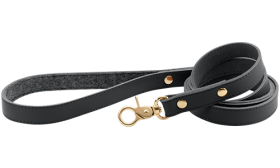 High-end Genuine Leather Dog Leash High-end black genuine leather dog leash, 120 cm in length and durable, gold metal clasp and studs for a luxurious look.
